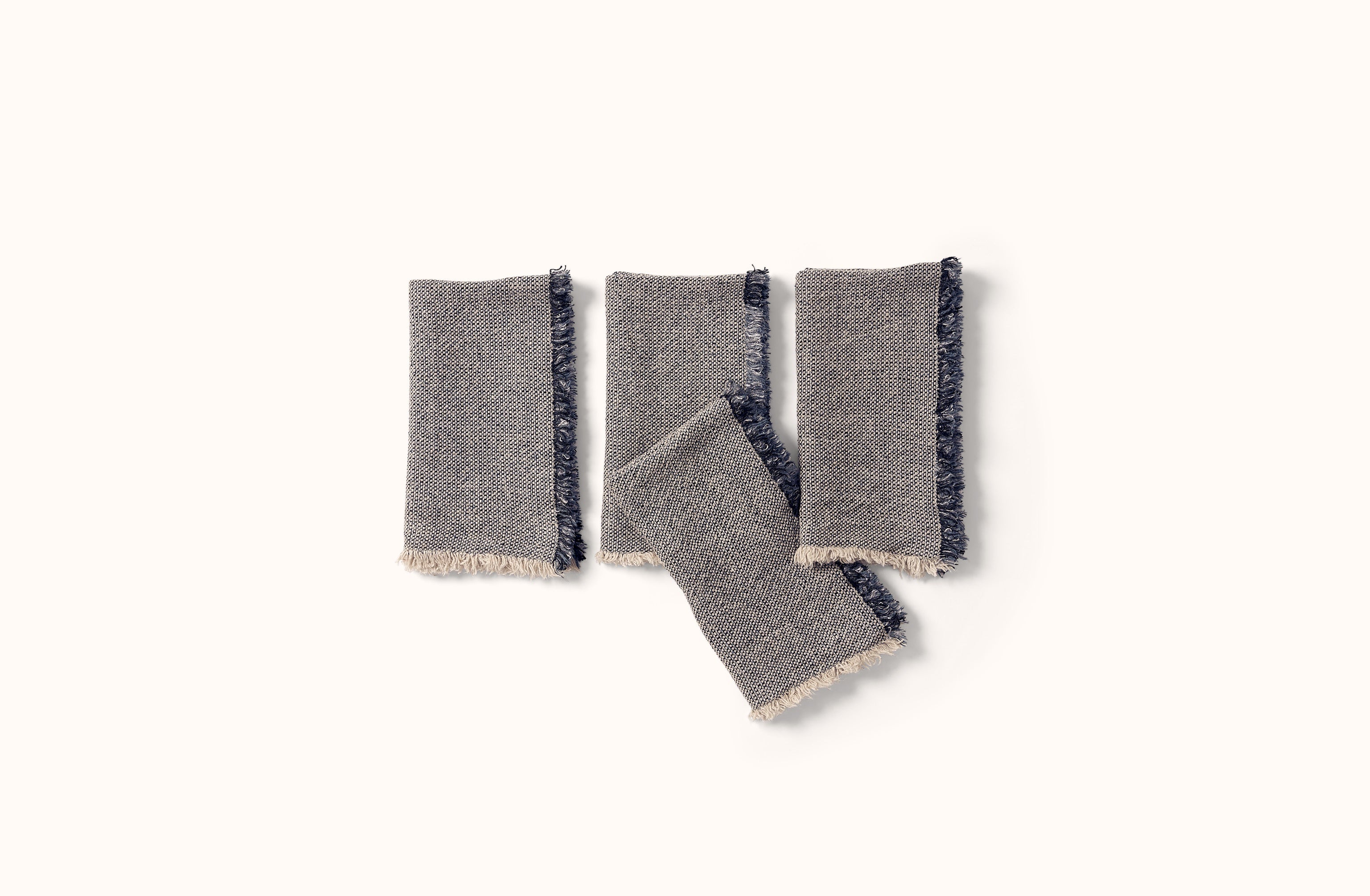 CHARVET NATURAL WITH BLUE AND BLACK MELANGE FRINGE EDGE LINEN NAPKIN