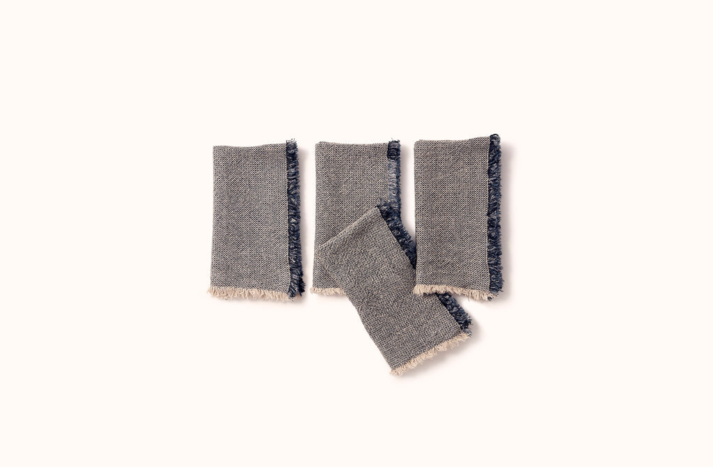 CHARVET NATURAL WITH BLUE AND BLACK MELANGE FRINGE EDGE LINEN NAPKIN
