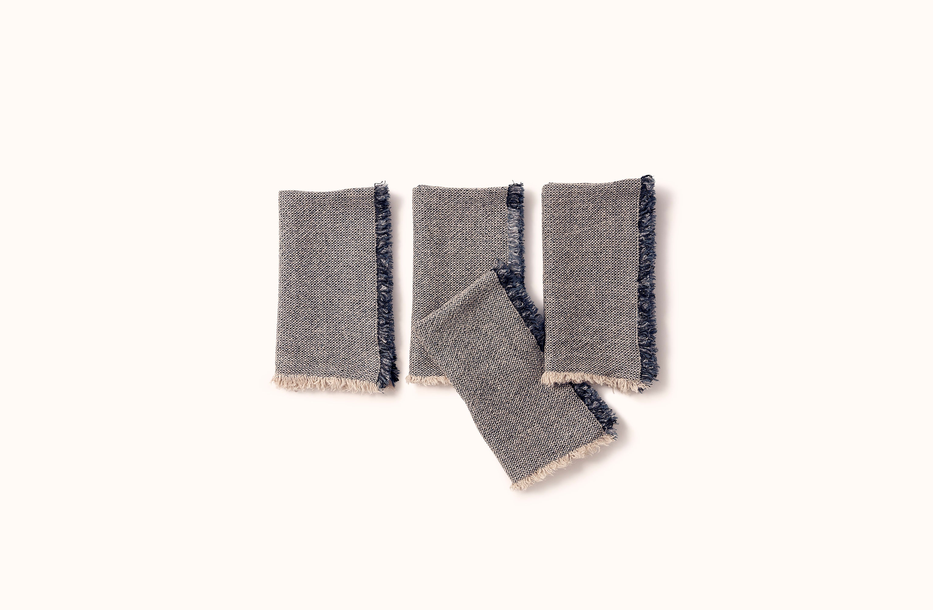 CHARVET NATURAL WITH BLUE AND BLACK MELANGE FRINGE EDGE LINEN NAPKIN