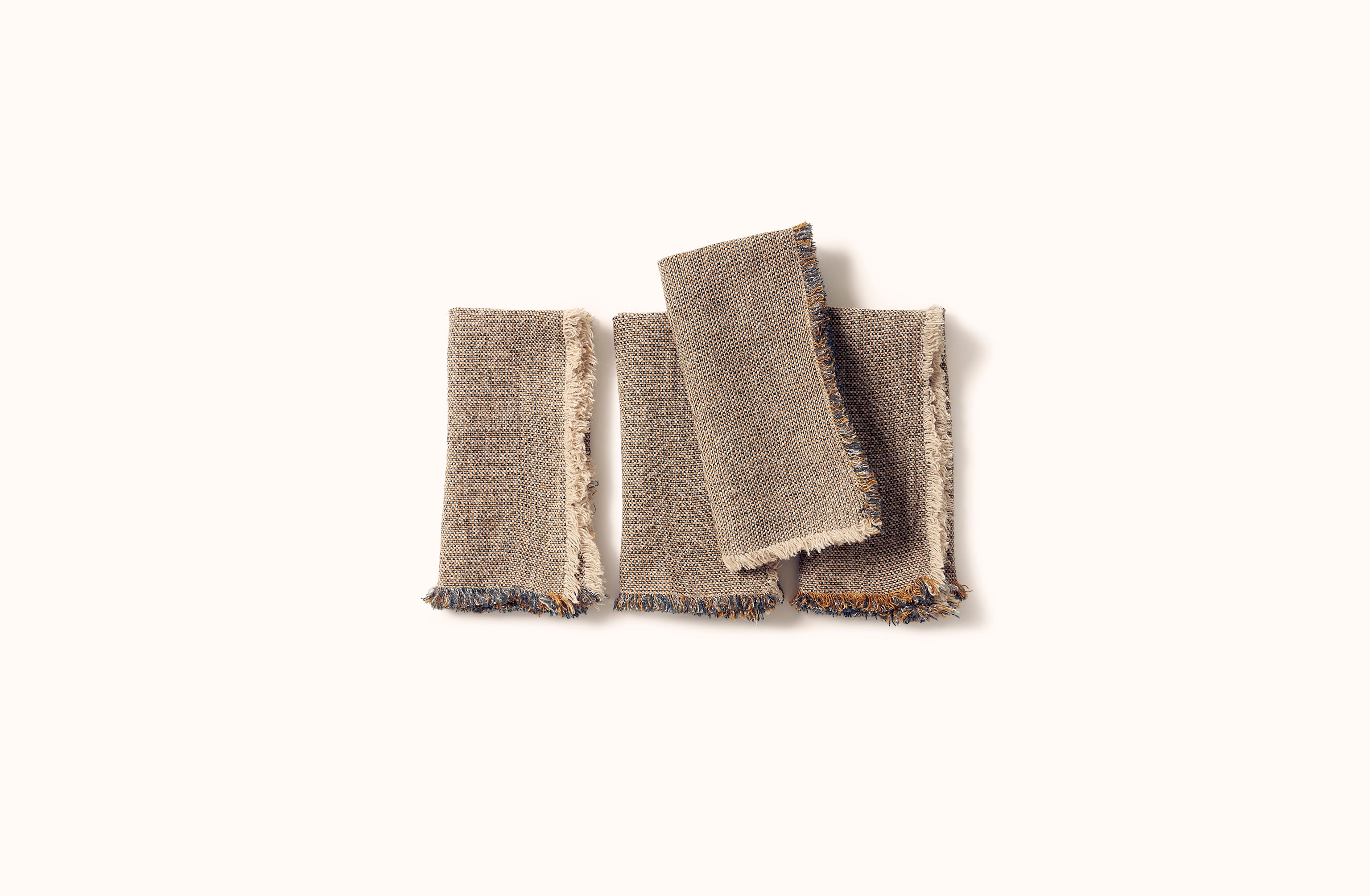 CHARVET NATURAL WITH BLUE AND RUST MELANGE FRINGE EDGE LINEN NAPKIN
